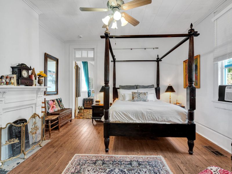 Spacious primary bedroom with king bed