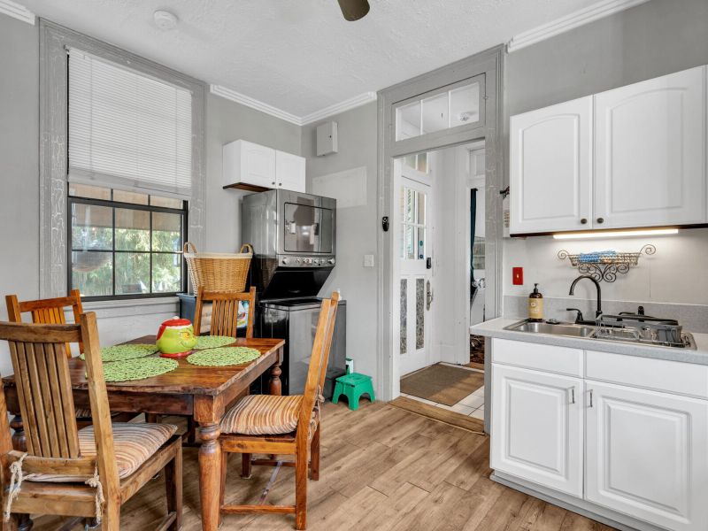 Bright, open kitchen with cozy dining nook