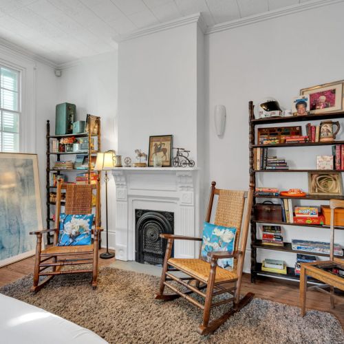 Classic NOLA living room with fireplace