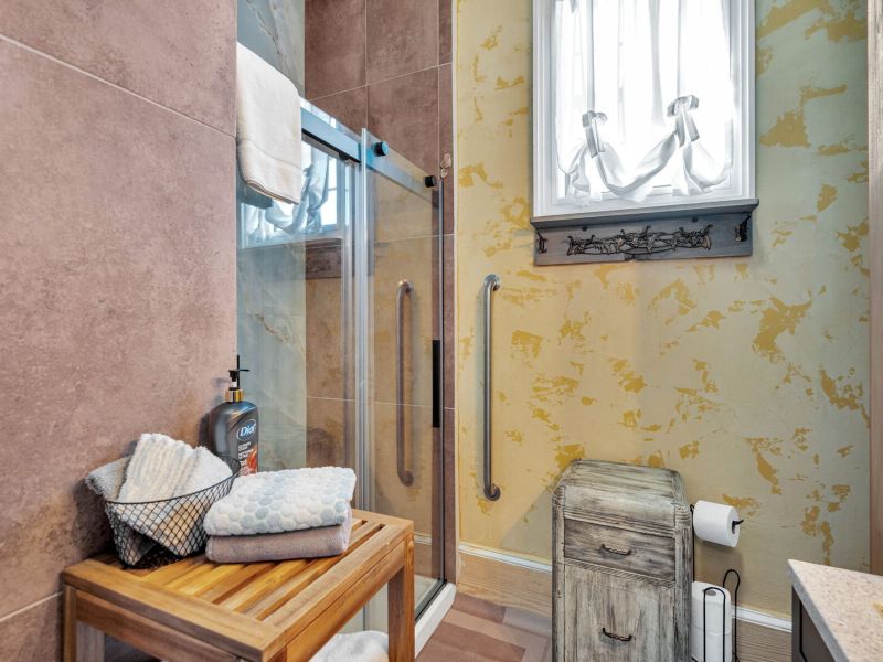 Bright walk-in shower with vintage charm