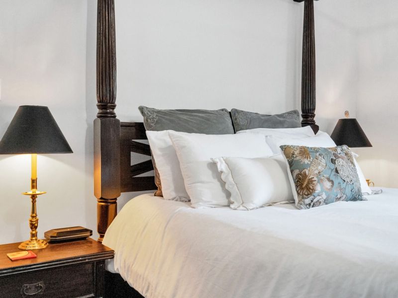 Plush Queen bed dressed for total comfort