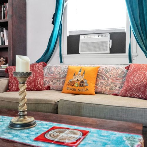 Relaxed living space with signature Book NOLA touches