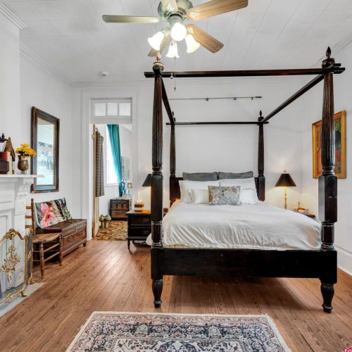 Spacious primary bedroom with king bed