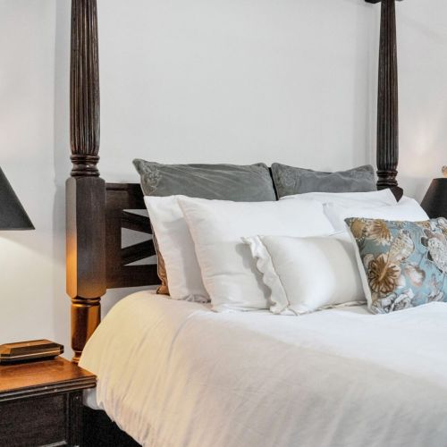 Plush Queen bed dressed for total comfort